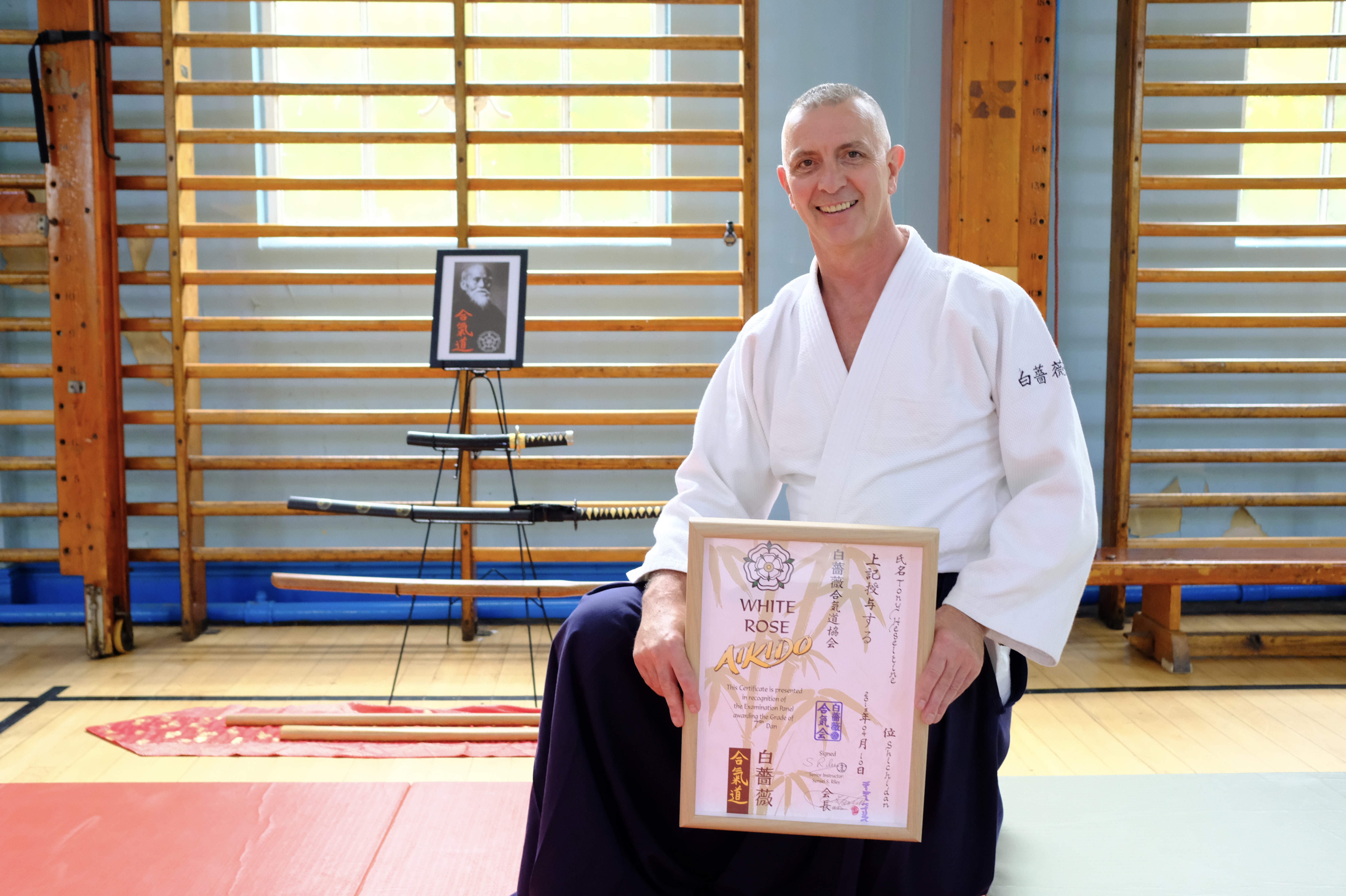 Sensei Heseltine with his 7th Dan certificate